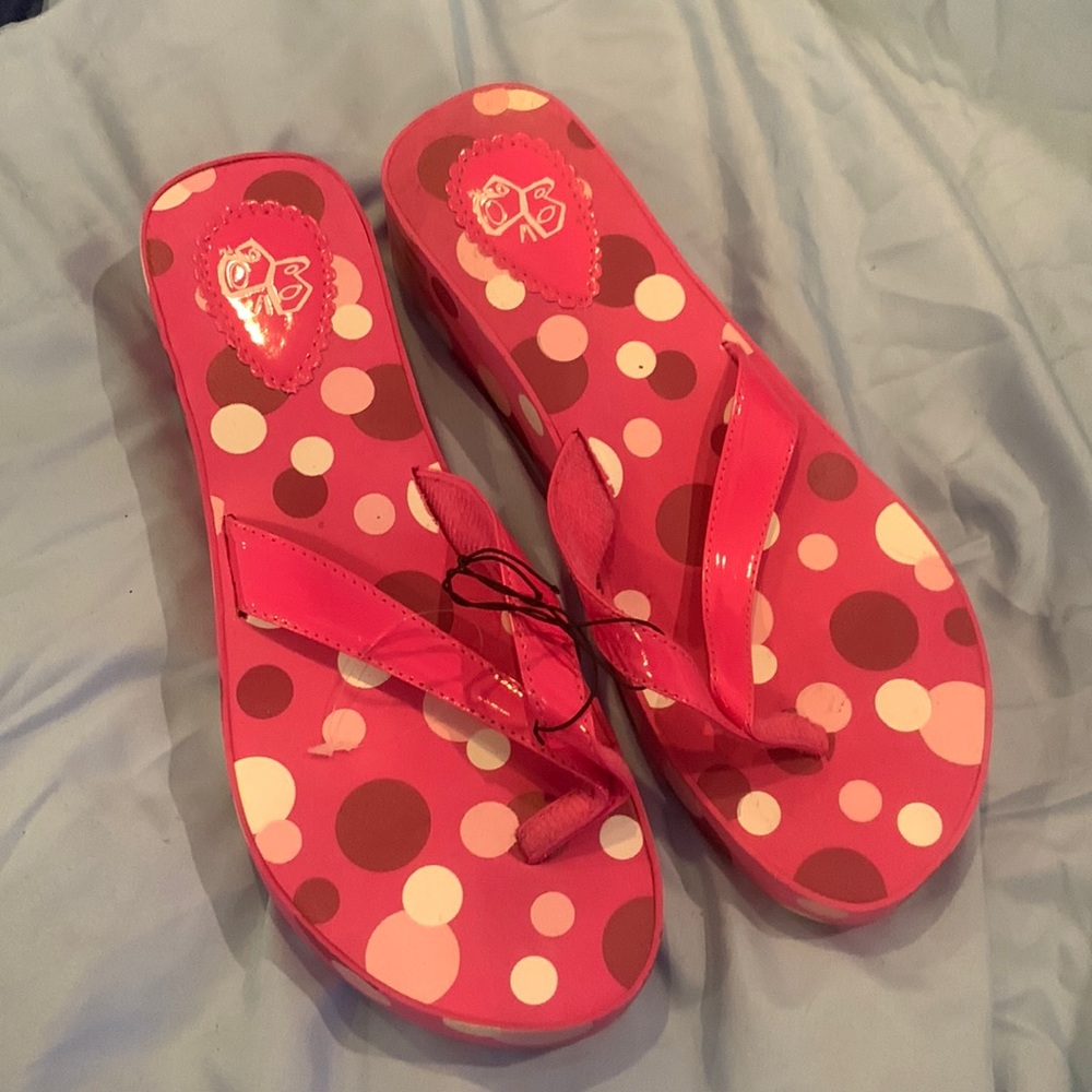 New with tags never worn size 11/12 pink with pink white poka dots.
